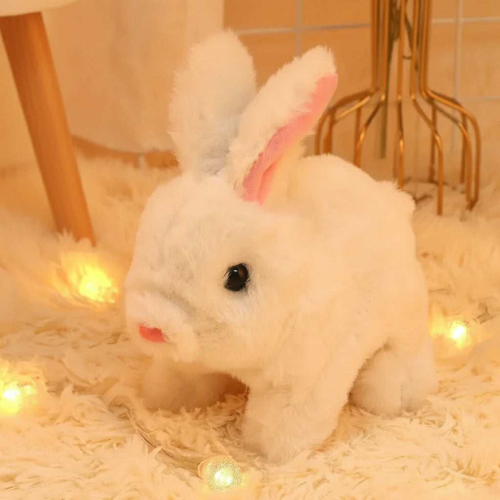 Plush toy rabbit with text on a soft surface